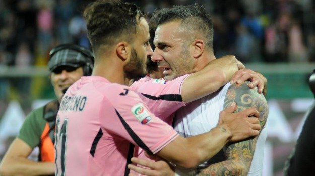 A tearful Sorrentino embraces Gilardino after the Palermo match against Verona