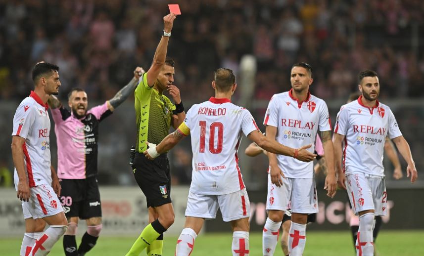Padova captain Ronaldo is sent off as Nicola Valente cheers in the background